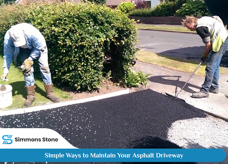Maintenance work on asphalt driveway installation