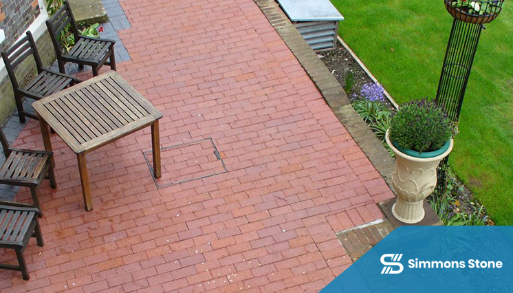 Traditional clay paver driveway in warm red tones installed