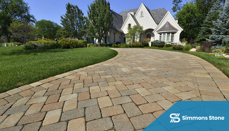 Restored residential driveway with clean, level pavers