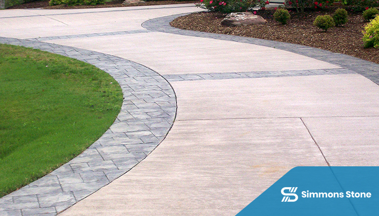 Concrete driveway in a graden setting