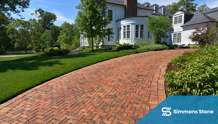 Clay brick pavers arranged for a backyard garden path
