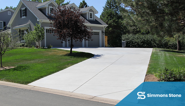 Concrete driveway outside a suburban residential home