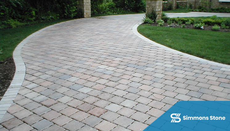 Close-up of paver walkway with concrete border edging
