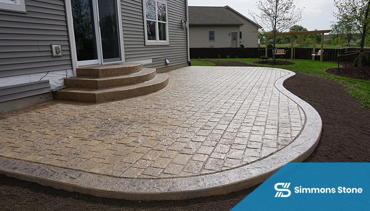 Stamped concrete backyard patio