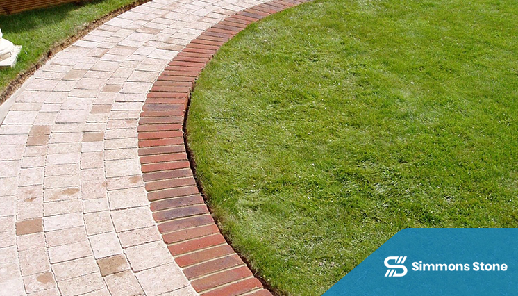 Garden path with natural stone paver border