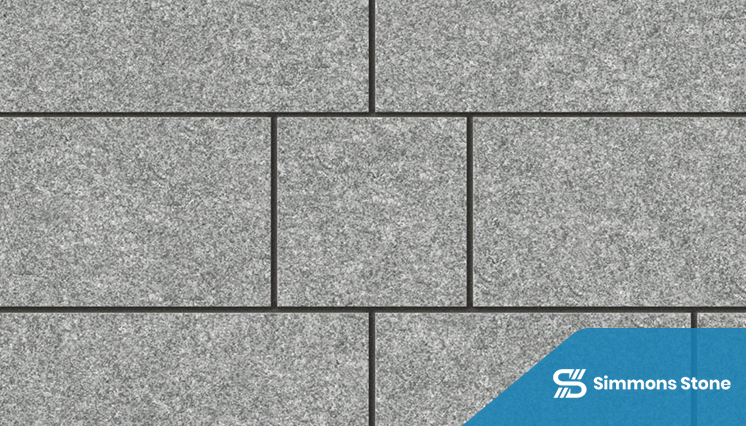 Elegant granite paving stone driveway with clean joints