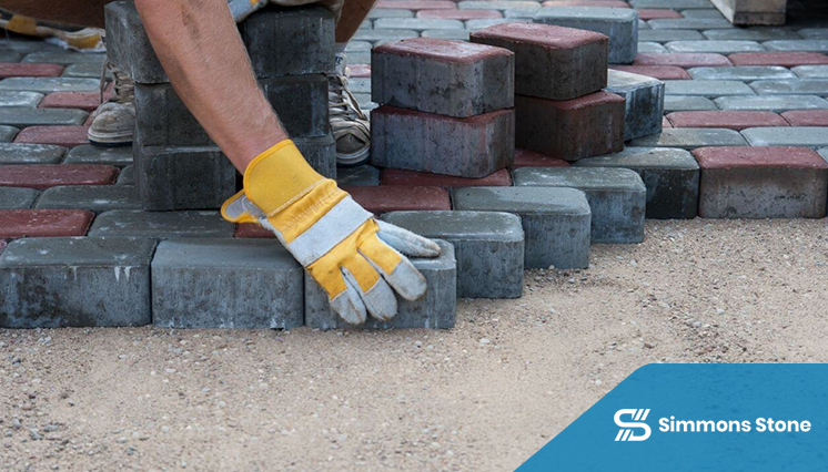 Custom stone paving installation for a backyard patio