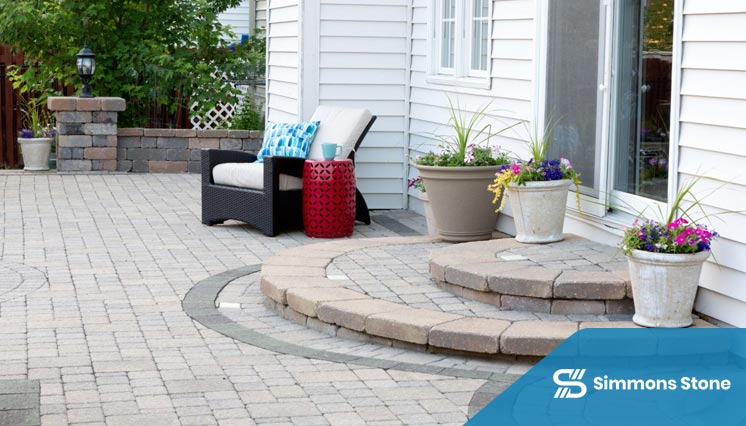 Brick paver walkway seamlessly connected to patio surface