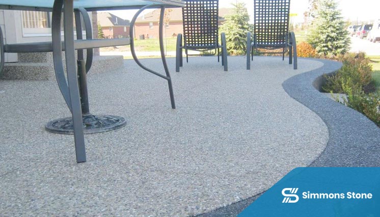 Decorative exposed aggregate patio installation