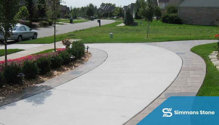 Wide concrete sidewalk for commercial property access