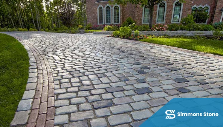 Decorative natural stone pavers integrated into a custom outdoor layout