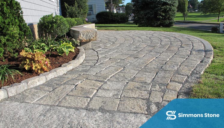 Close-up of natural stone driveway surface after sealing