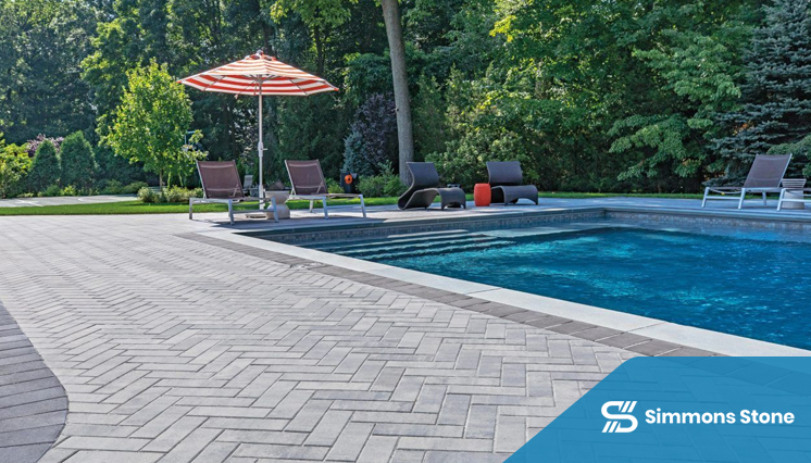 Stamped concrete pool deck with decorative pattern and texture