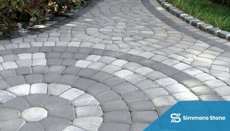 Custom paving design with patterned stone layout