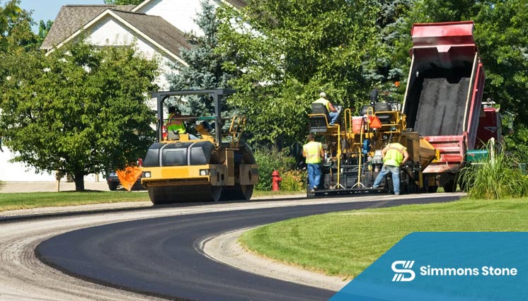 Asphalt paving machine compacting surface