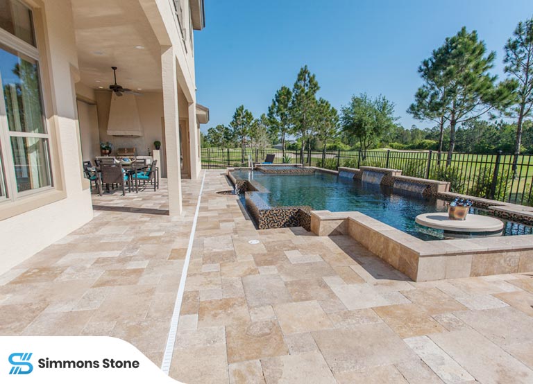 Slip-resistant porcelain pavers used in a modern pool deck design