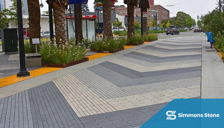 Colored concrete driveway with custom design