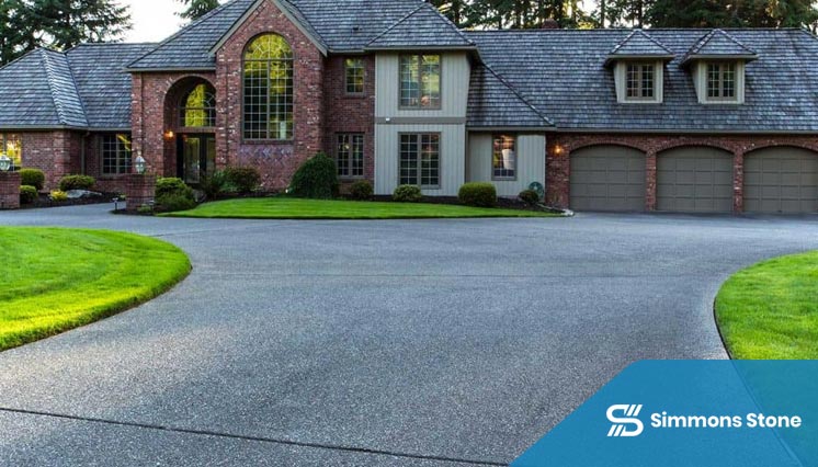 Smooth, dark asphalt driveway after repair