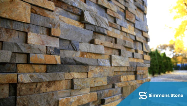 Residential exterior finished with stacked stone veneer