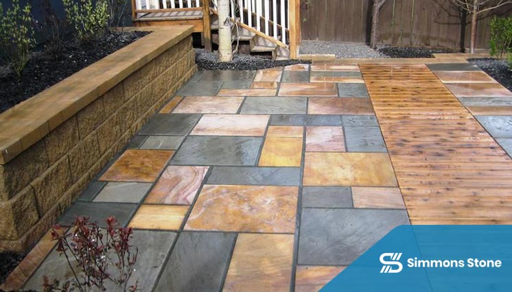 Stone paver patio connected to outdoor living area