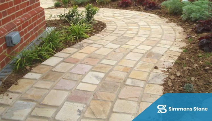 Sandstone paving in landscaped garden