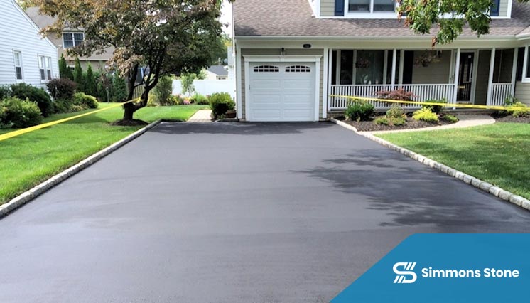 Finished asphalt driveway with a clean look