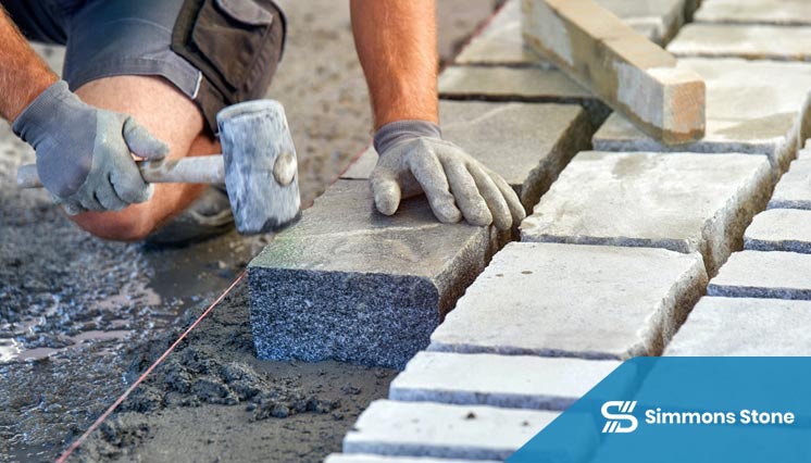 Concrete sidewalk installation along street
