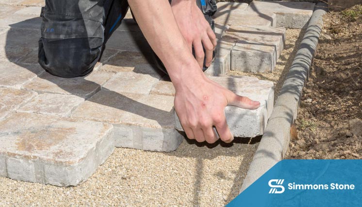 Marble paving installation in a residential courtyard